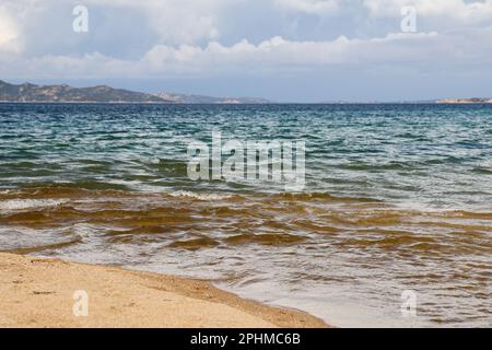 Wild beach of Sassari in the Italian region Sardinia, northwest of Olbia. Sea coast of Italy with clare azure blue water and sandy wild beach. Stock Photo