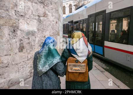 Two ladies wearing headscarfs walk next to Istanbul Metro Line in Istanbul City Centre in Turkey on the 5th April, 2023. Credit: SMP News / Alamy Live Stock Photo