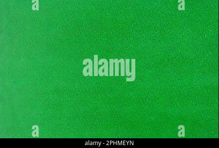 Rough bright hard green cardboard, sheet as texture, background or backdrop for holiday decoration Stock Photo