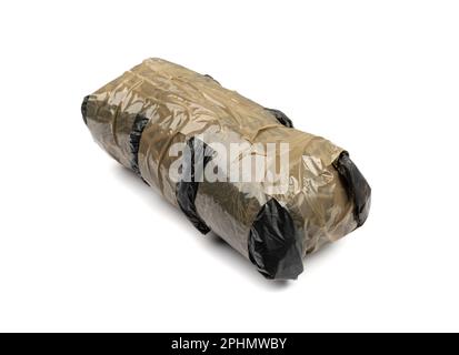 Seized drug bag isolated. Drugs package, heroin bricks, cocain pack, smuggling, drugs trafficking on white background Stock Photo