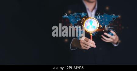 Businessman use magnifying glass for CRM, Customer Relationship Management. HR, human resource search personnel. Global structure customer network tec Stock Photo