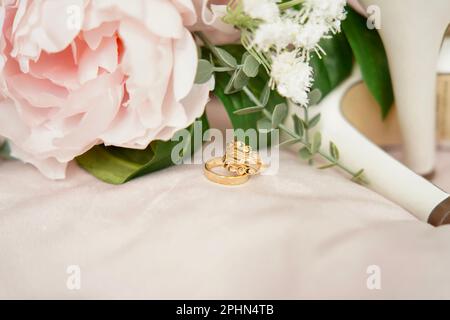 Luxury gold wedding ring, selective focus Stock Photo