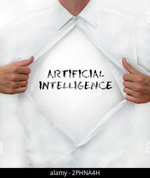 Man opens his shirt to reveal AI - Artificial Intelligence - written on it Stock Photo