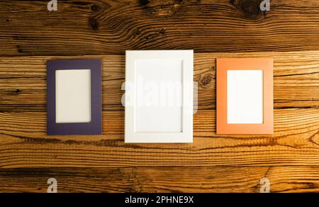 Blank Paper Photo Frames Top View, Empty White Frame on Wood Table Flat Lay Mockup, Pleasant Memories Concept, Paper Photo Frames Texture Background w Stock Photo