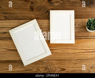 Blank Paper Photo Frames Top View, Empty White Frame on Wood Table Flat Lay Mockup, Pleasant Memories Concept, Paper Photo Frames Texture Background w Stock Photo
