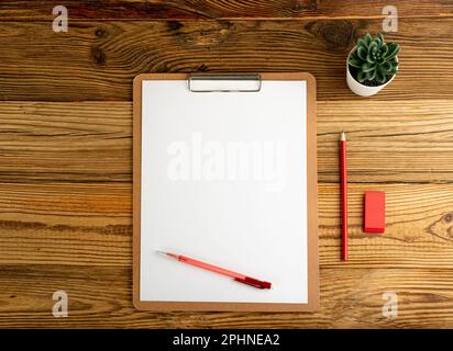 Blank Paper Tablet Top View, Empty White Sheet on Wood Table Flat Lay Mockup, Paper Tablet Texture Background with Copy Space Stock Photo