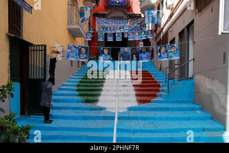 Naples, Italy. 29th Mar, 2023. A staircase in the center of the Spanish quarters bearing the colors of the SSC Napoli soccer team and bearing the effigy of the 'scudetto,' the symbol with the colors of the Italian flag that is affixed to the jersey of the team that wins the Italian Serie A soccer championship. Preparations are in full swing in the city to celebrate the final victory of SSC Napoli, which leads the Italian championship by 19 points. Credit: Independent Photo Agency/Alamy Live News Stock Photo