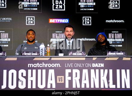 Boxing promoter Eddie Hearn (centre) Anthony Joshua (left) and Jermaine Franklin during a press conference at Nobu Hotel London Portman Square, London. Picture date: Wednesday March 29, 2023. Stock Photo