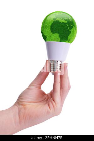 Eco LED bulb in hand isolated on a white background. Green energy concept. Stock Photo