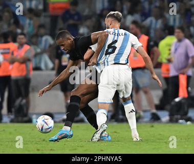 28th March 2023: Mario Kempes stadium, Córdoba, Argentina: International friendly football, Argentina versus Curacao: Germán Pezzella of Argentina challenges Rangelo Janga of Curacao Stock Photo