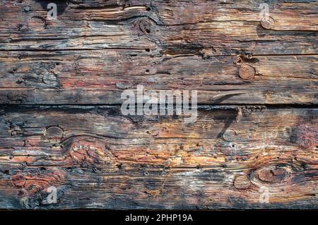 Wooden planks from hull of an old ship. Closeup of wood planks. Texture background. Cover photo. Stock Photo