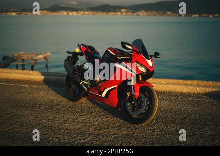 Izmir, Turkey - September 25, 2022: Side view photo of a Honda CBR 1000 RR fireblade racing motorcycle on a sea background Stock Photo