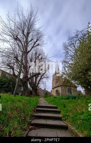 Steps and footpath leading towards a classical church in Cambridge, UK Stock Photo