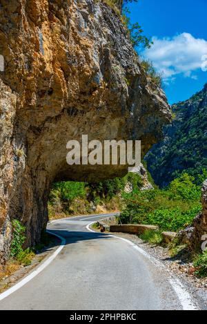 Tunnel at a road passing through Langada pass in Greece. Stock Photo