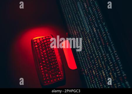 Cyber security. Program code on screen. Using computer and programming to break code. Cyber security threat. Internet and network security. Stealing p Stock Photo