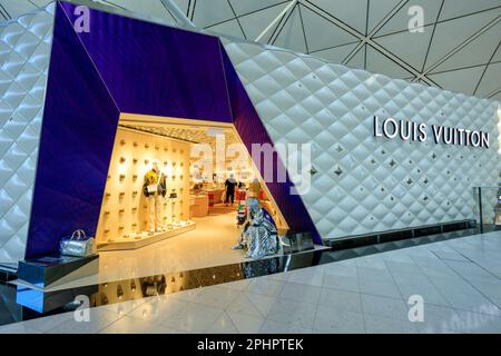 Louis Vuitton luxury store and lounge within Hamad International Airport in  Doha, Qatar, with an Orchard with sustainable Green Concourse Stock Photo -  Alamy