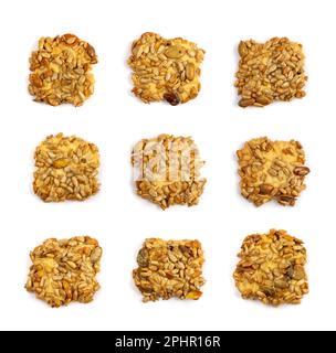 Simple cookie with nuts, seeds and cereals isolated. Oatmeal sugar bitten cookies set, sunflower seed biscuit. Round biscuit collection top view Stock Photo