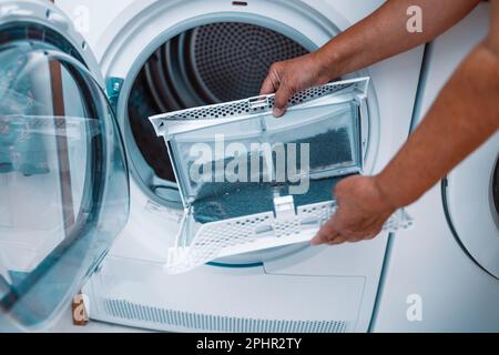 https://l450v.alamy.com/450v/2phr2ty/dust-and-dirt-trapped-by-the-clothes-dryer-filter-2phr2ty.jpg