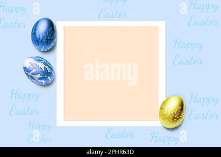 Frame and three easter eggs colored blue and golden yellow. Happy Easter card with copy space for text. Minimal style. Stock Photo