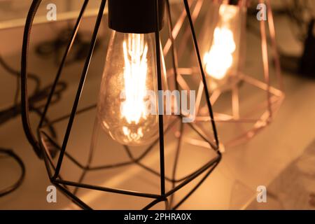 Table Retro Lamps, Vintage Style Industrial Lightbulbs, Stylish Warm Light Bulb in Interior, Retro Lams Stock Photo