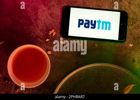 In this photo illustration, the Paytm logo is seen displayed on a mobile phone screen. Stock Photo