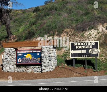 Old signs. Los Angeles County Fire Department, California Department of Corrections and Rehabilitation,  Holton Conservation camp 16 at 12652 N. Little Tujunga Canyon road, and open to the public shooting ranges direction old signs, in Sylmar,  California, Stock Photo