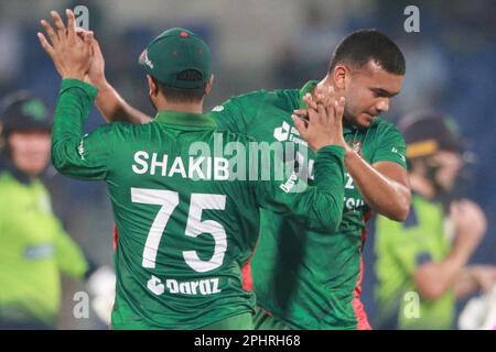 Taskin Ahmed celebrates alon Shakib Al Hasan one of his three wickets Bangladesh saw a number of records break in their thumping 77-run win over Irela Stock Photo