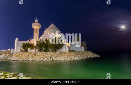 White Salem Bin Laden Mosque built on the island in the moonlight with sea in the background, Al Khobar, Saudi Arabia Stock Photo