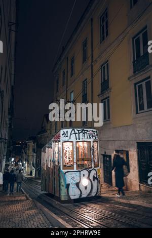 Old tram through the streets of beautiful Lisbon. Stock Photo