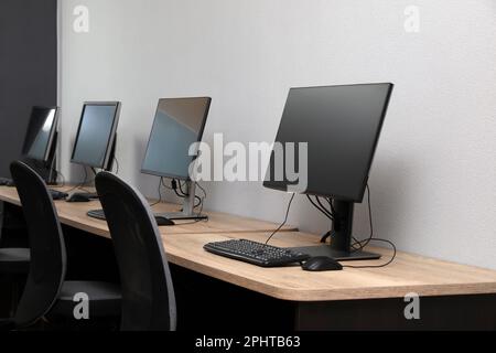 Many modern computers in open space office Stock Photo