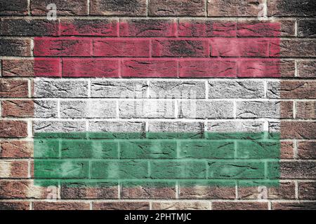Hungary flag painted on brick wall background Stock Photo