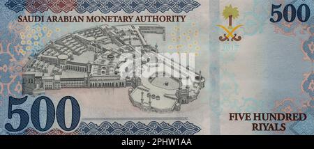 Large fragment of the reverse side of 500 five hundred Saudi riyals banknote features Kaaba in Mecca city inside the holy mosque Stock Photo