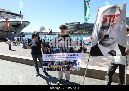 Sydney, Australia. 30th March 2023. Ukrainians and their supporters protested outside the Sydney offices of the Australian Olympic Committee which are located in the Museum of Contemporary Art Australia (MCAA) building at 140 George Street, The Rocks. A statement by protest organisers reads: ‘The International Olympic Committee plans to allow russian athletes to participate in Paris Olympic Games in 2024. Let's put pressure on the Australian Olympic Committee to vote against such decision. We all know that russia is using major sporting events as a platform to spread their propaganda, to white Stock Photo