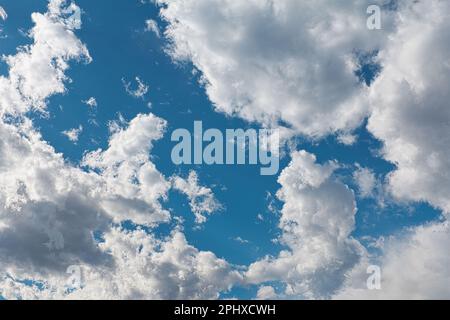 Spring blue sky with many clouds Stock Photo