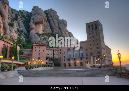 Sunrise over Santa Maria de Montserrat abbey in Spain. Stock Photo