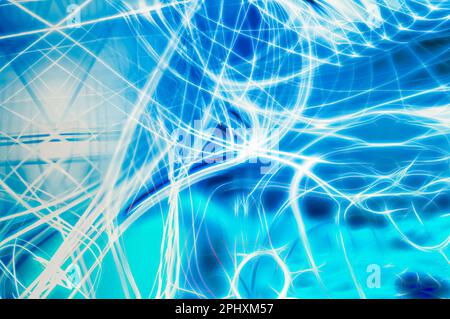 Abstract background of bright glowing white and blue neon uneven lines crossing each other Stock Photo