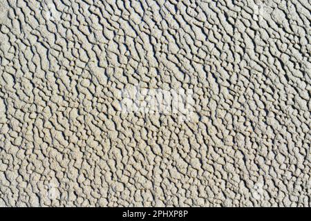 Abstract background created from sand textures that resemble the rippling patterns of water over time. Stock Photo