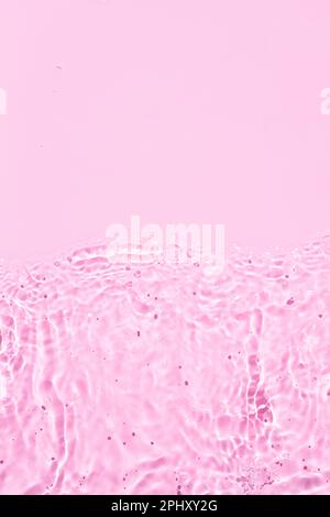 Abstract pink background of waves and ripples on the water Stock Photo ...