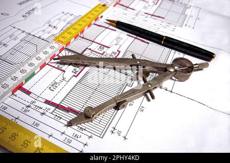 architectural drawing with folding rule, pencil and compass Stock Photo