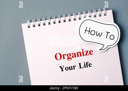 How To Organize Your Life with bubble speech on personal organizer diary. Stock Photo