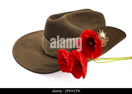 Anzac Day army slouch hat with red poppy isolated on white background. Stock Photo