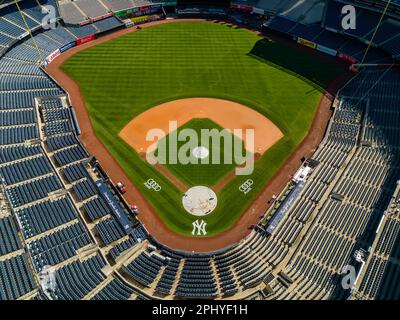 An aerial view of a Yankee Stadium featuring a grass field on a sunny day Stock Photo