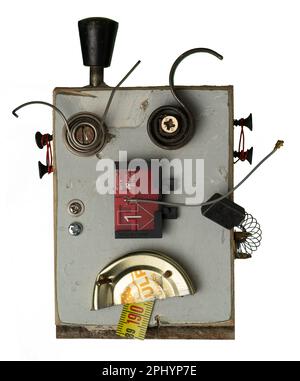 A robotic head made of wood and various small industrial parts isolated on the white background Stock Photo