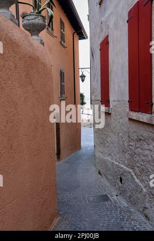 The view of town of Limone del Garda on Lake Garda in a sunny day. Province of Brescia, Lombardia, Italy. Stock Photo