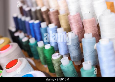 Set Of Multi-colored Spools Of Thread For Sewing Close-up Stock