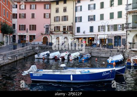 The view of town of Limone del Garda on Lake Garda in a sunny day. Province of Brescia, Lombardia, Italy. Stock Photo