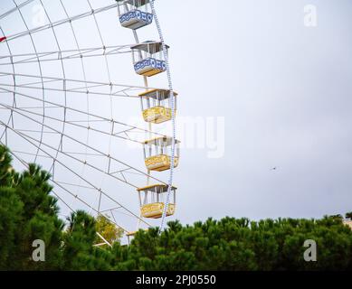 Ferris Wheel detail over grey sky, landscape view Stock Photo