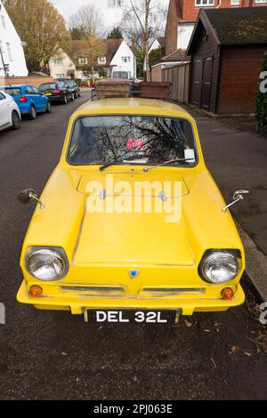 Tribute classic car 'copy' of Del Boy's Reliant Regal (1968 model in the TV series) yellow van from Only Fools and Horses television programme. (133) Stock Photo