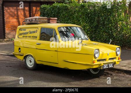 Tribute classic car 'copy' of Del Boy's Reliant Regal (1968 model in the TV series) yellow van from Only Fools and Horses television programme. (133) Stock Photo