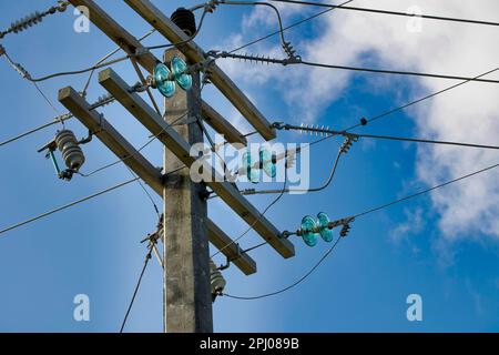 Concrete electricity poles with porcelain and glass insulators, Mauritius Stock Photo